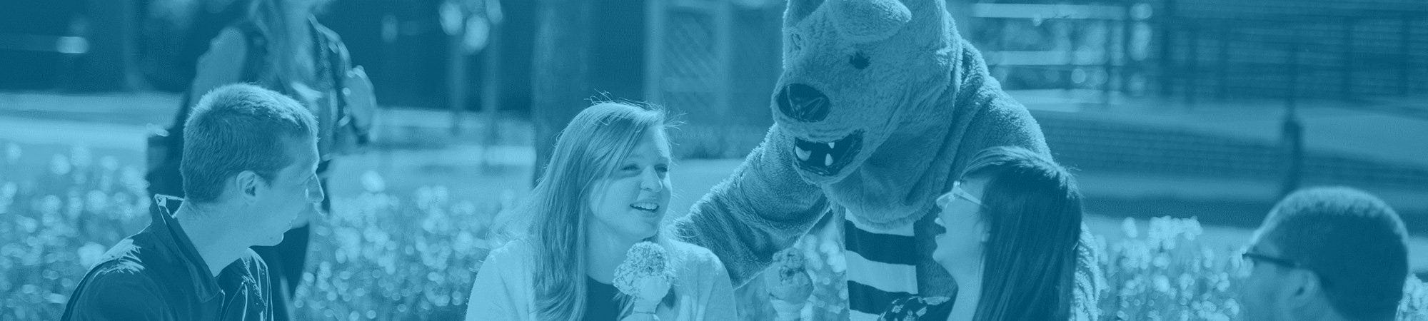 Nittany Lion and students with ice cream